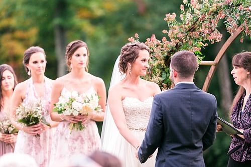 Romantic summer outdoor winery wedding with wooden arbor available for rent by Paisley and Jade