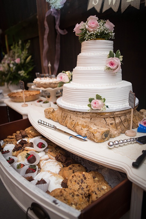 Rustic Wooden Cake Stand and White Sideboard create a dessert display with items available to rent from Paisley & Jade