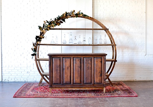 Our round wooden arbor designed and styled in three unique vignettes - all pieces available to rent for your event by Paisley & Jade 