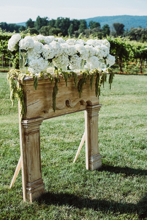 Charming outdoor vineyard wedding in Charlottesville with specialty and vintage rentals provided by Paisley & Jade 