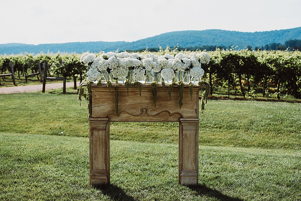 Charming outdoor vineyard wedding in Charlottesville with specialty and vintage rentals provided by Paisley & Jade