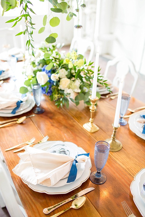 Beautiful white and blue wedding inspiration styled shoot from the Hope Taylor Photography Workshop with space and specialty rentals provided by Paisley & Jade 