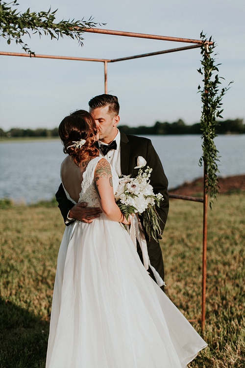Cool and modern riverside wedding in Virginia with vintage and specialty rentals by Paisley and Jade 