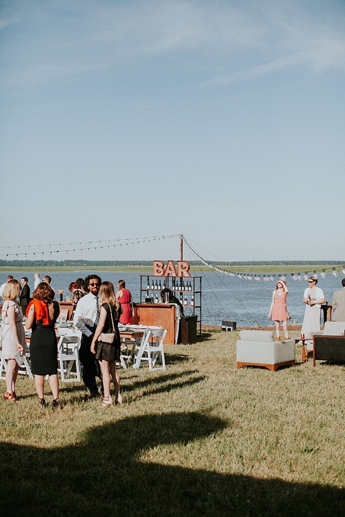 Cool and modern riverside wedding in Virginia with vintage and specialty rentals by Paisley and Jade 