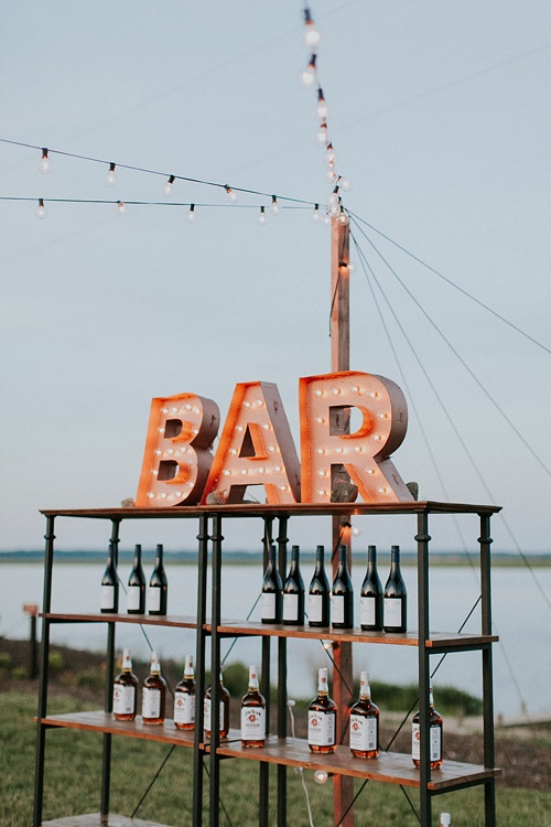 Cool and modern riverside wedding in Virginia with vintage and specialty rentals by Paisley and Jade 