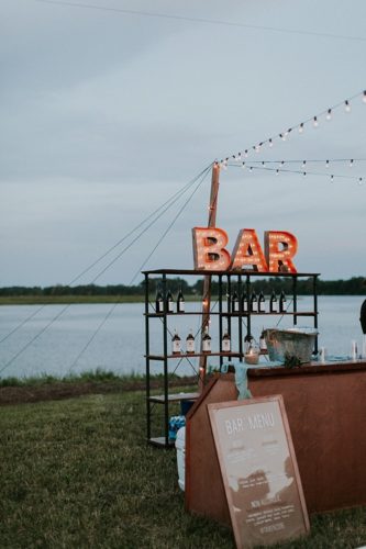 Cool and modern riverside wedding in Virginia with vintage and specialty rentals by Paisley and Jade
