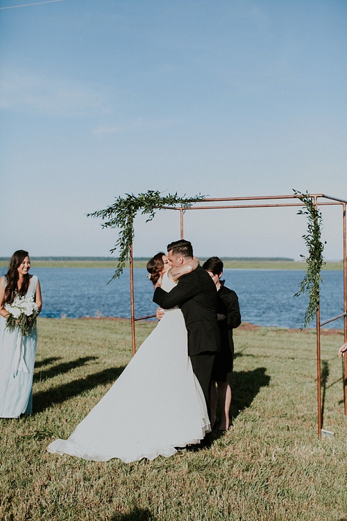 Cool and modern riverside wedding in Virginia with vintage and specialty rentals by Paisley and Jade 