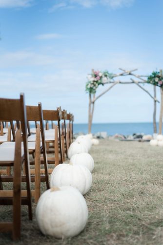Wonderful waterfront Fall wedding on the Eastern Shore of Virginia with specialty and vintage rentals provided by Paisley and Jade