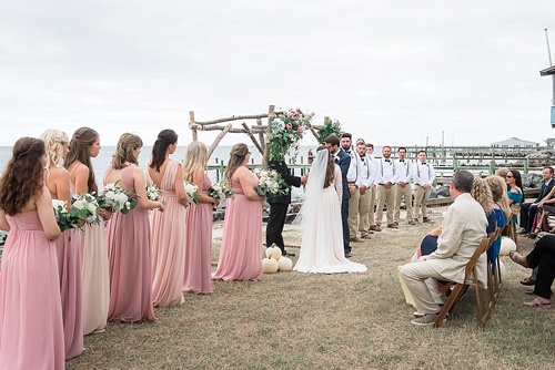 Wonderful waterfront Fall wedding on the Eastern Shore of Virginia with specialty and vintage rentals provided by Paisley and Jade 