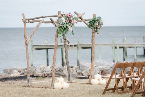 Wonderful waterfront Fall wedding on the Eastern Shore of Virginia with specialty and vintage rentals provided by Paisley and Jade 