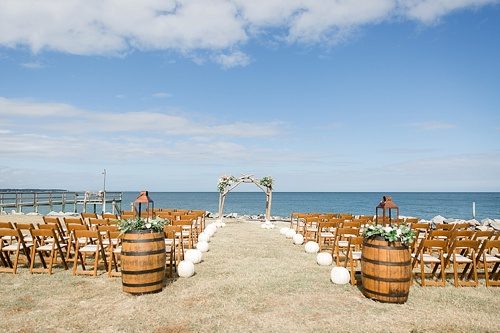 Wonderful waterfront Fall wedding on the Eastern Shore of Virginia with specialty and vintage rentals provided by Paisley and Jade