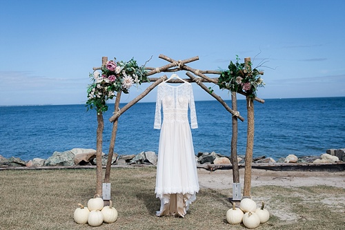 Wonderful waterfront Fall wedding on the Eastern Shore of Virginia with specialty and vintage rentals provided by Paisley and Jade 