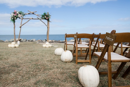 Wonderful waterfront Fall wedding on the Eastern Shore of Virginia with specialty and vintage rentals provided by Paisley and Jade 