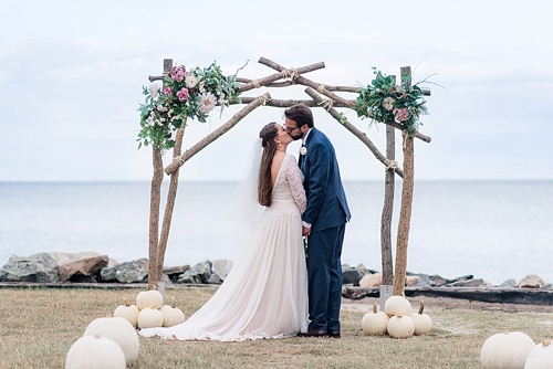 Wonderful waterfront Fall wedding on the Eastern Shore of Virginia with specialty and vintage rentals provided by Paisley and Jade 