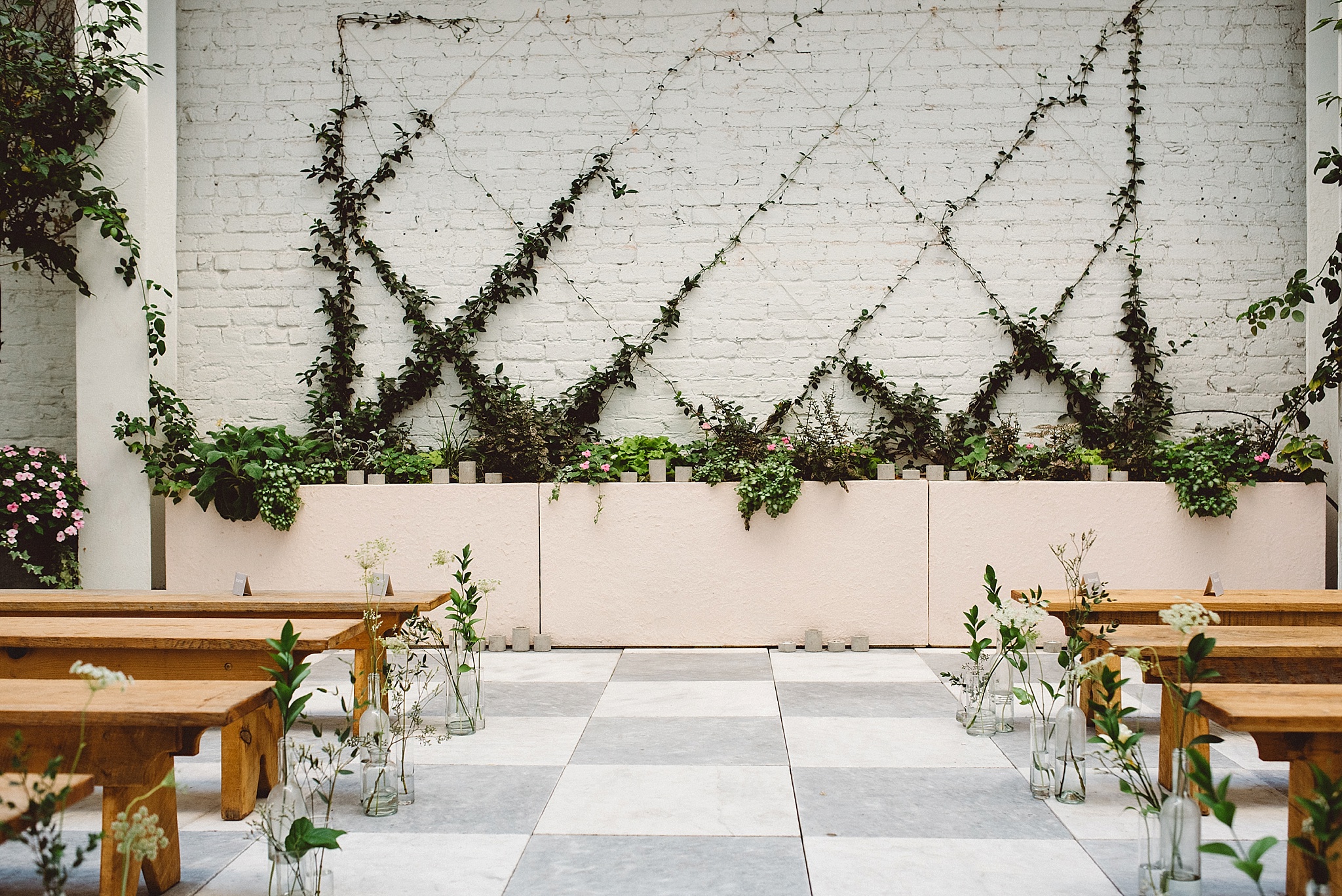 Chic and charming courtyard wedding at Quirk Hotel in Richmond, Virginia with specialty and vintage rentals by Paisley & Jade