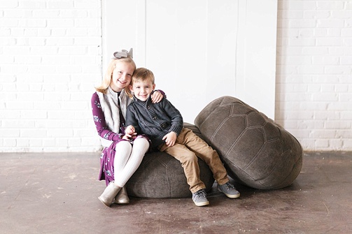 Cute and charming family holiday photos with studio space and specialty rentals provided by Paisley & Jade 