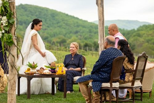 Stunning outdoor ceremony for an Indian wedding at Pippin Hill with specialty and vintage rentals by Paisley & Jade 