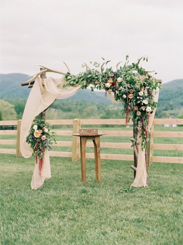 Beautiful boho farm wedding and reception with specialty and vintage rentals by Paisley & Jade 