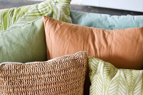 Styling with colorful and chic pillows at Highpoint & Moore with inventory, space and design by Paisley & Jade 