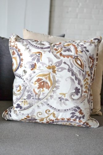 Styling with colorful and chic pillows at Highpoint & Moore with inventory, space and design by Paisley & Jade 