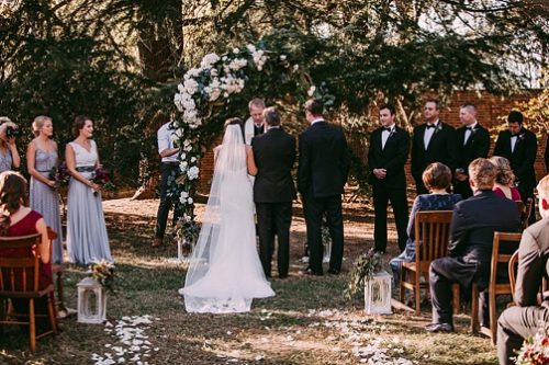 Stunning outdoor wedding ceremony in Richmond, Virginia with specialty and vintage rentals by Paisley and Jade 