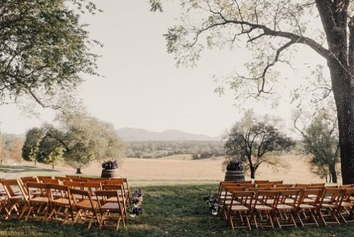 Romantic outdoor reception at Chiswell with specialty and vintage rentals by Paisley & Jade 