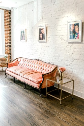 Beautiful pink vintage sofa stuns in various events with rental by Paisley and Jade 