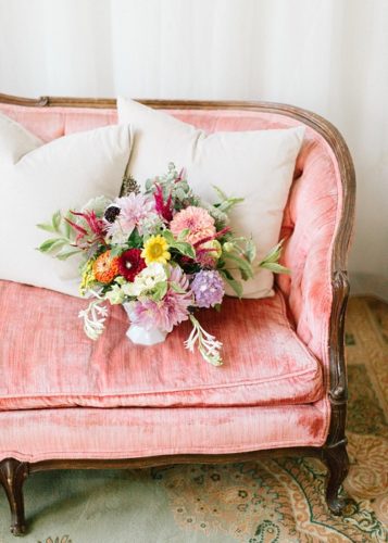 Beautiful pink vintage sofa stuns in various events with rental by Paisley and Jade 