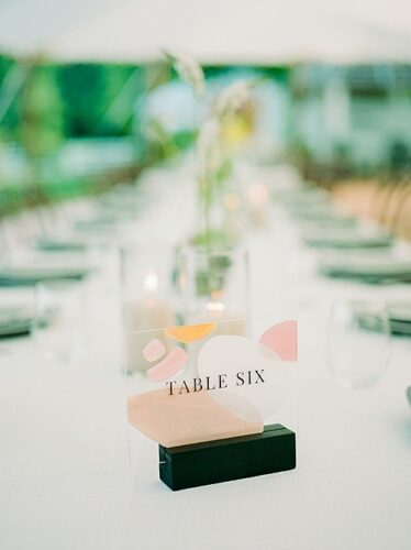 paisley and jade specialty event rentals at pharsalia venue with custom signage