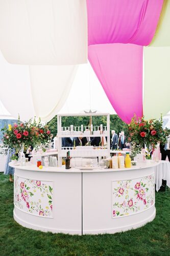 paisley and jade specialty event wedding rentals featuring colorful bar set ups