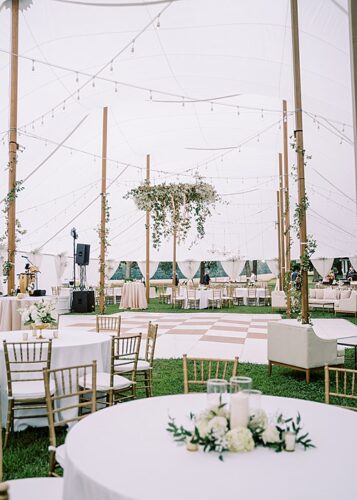 paisley and jade specialty rentals at classic neutral tented wedding with glint events