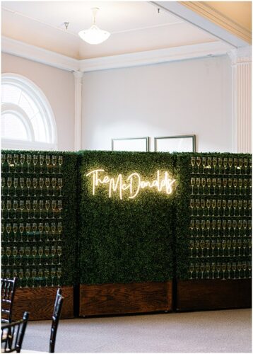 paisley and jade specialty wedding rentals and champagne wall at omni homestead