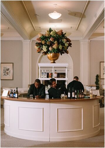 paisley and jade specialty wedding rentals and champagne wall at omni homestead