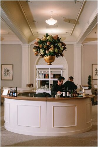 paisley and jade specialty wedding rentals and champagne wall at omni homestead