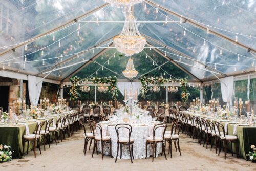 james chairs with neutral seat cushions for tented outdoor wedding reception
